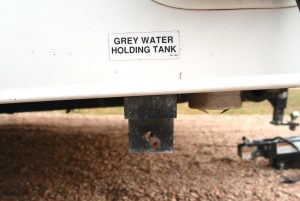 grey water tank rv how to empty