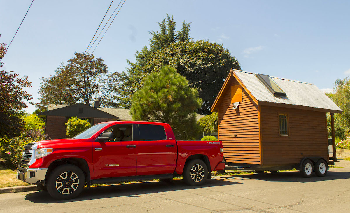 Kozy-Kabin-Tiny-House-Towing-from-Drivers-Side